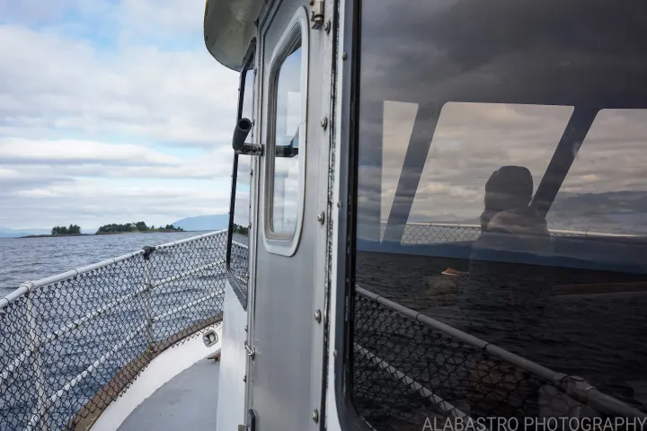 Side of Boat near Historic Guard Island Light in Clarence Strait, Ketchikan, AK. Photo by Alabastro Photography.